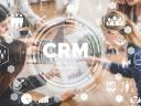 An abstract image of CRM and connected icons around the word CRM.