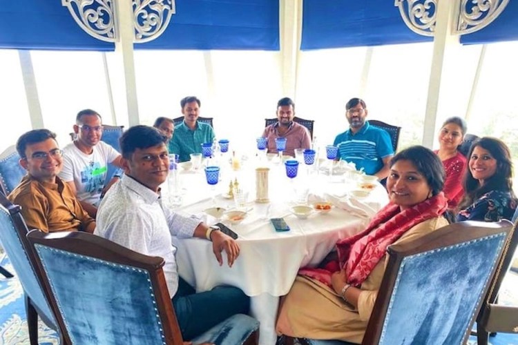 Chandrakala at a restaurant with her team