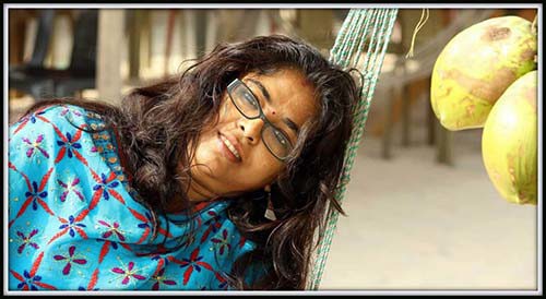 Photo of Mousumi relaxing in a hammock