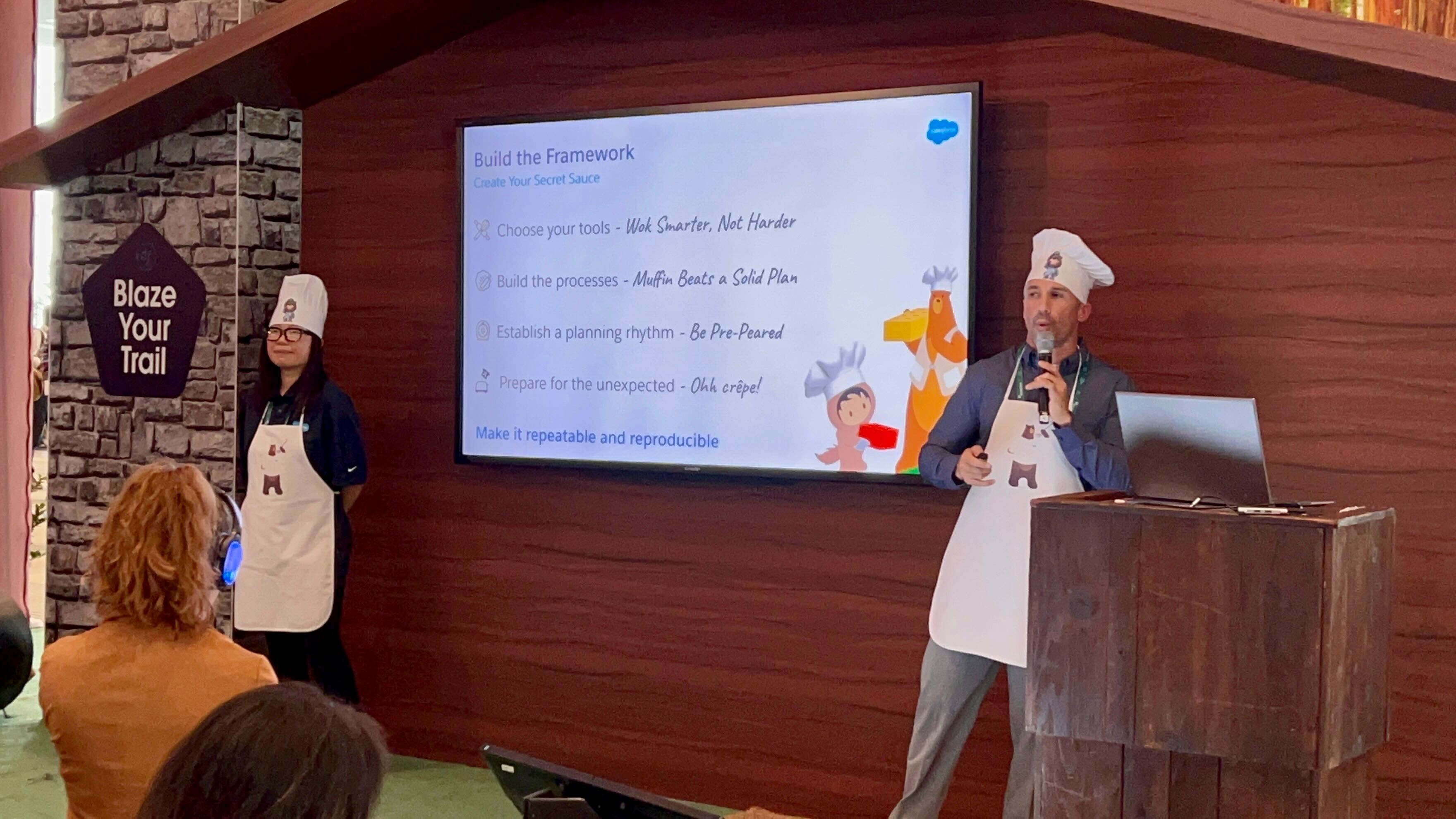 David with Jade Leong, Lead Demo Architect at Salesforce, at Dreamforce 2022, presenting a kitchen-themed presentation, “A Pinch of Inspiration and a Pound of Gratitude: A Recipe for How to Build a Trailblazer Community from Scratch"