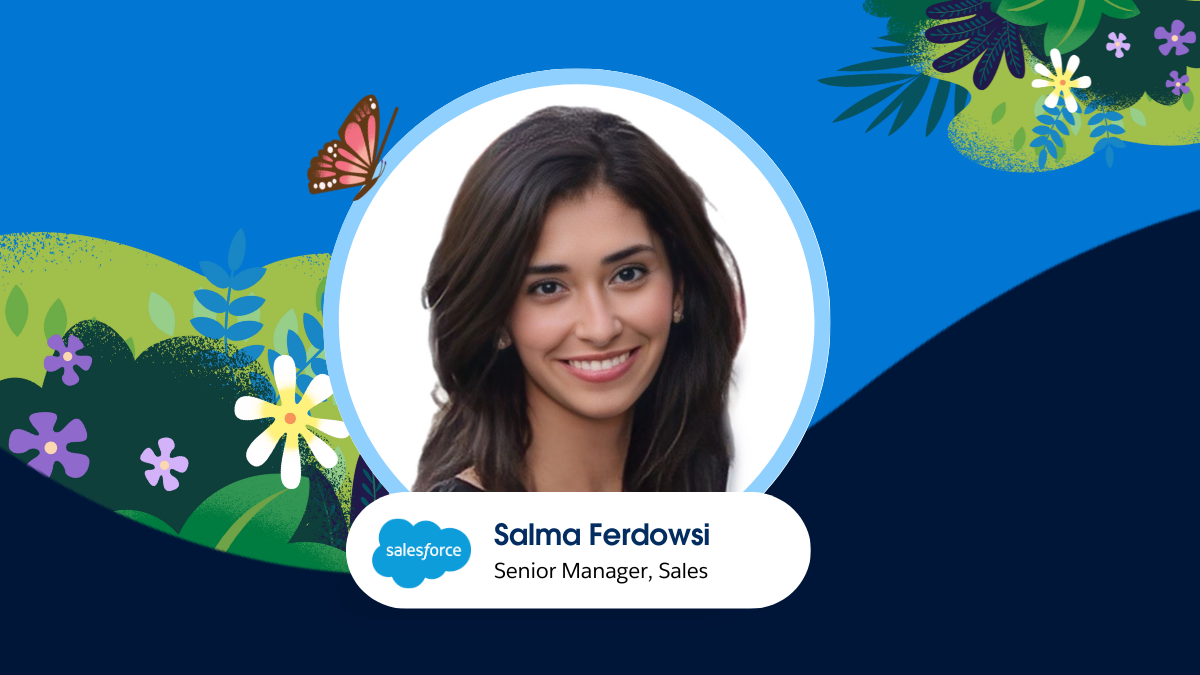 Photo of Salma Ferdowsi with a blue background. 