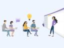 Coworkers sit in on a discussion to help navigate their AI path.