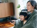 Families enjoying subscription services at home.