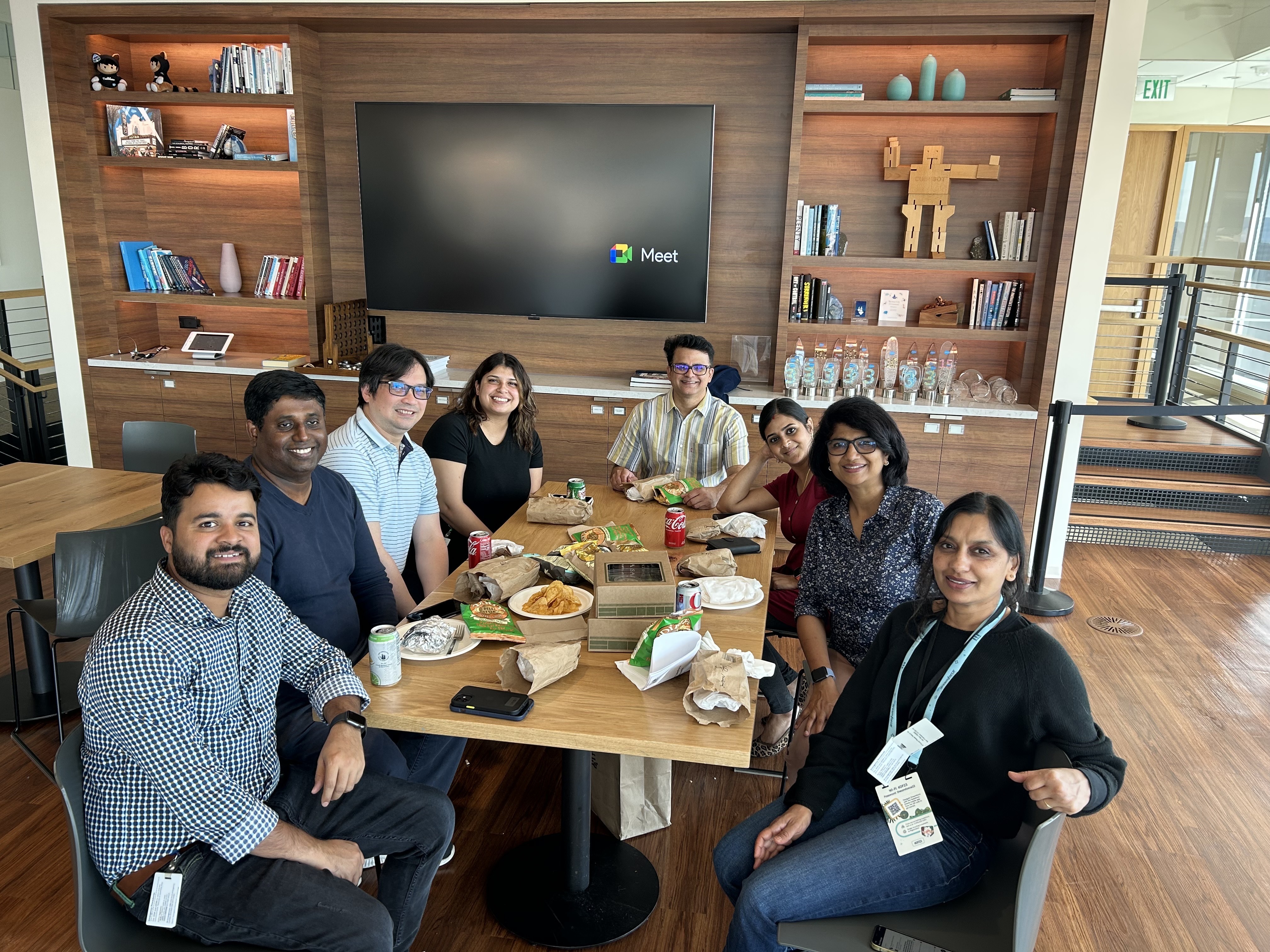 Stephanie (top left) at lunch with her CSG team at the San Francisco Tower.