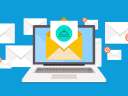 Illustration on a blue background of email envelopes floating around a laptop / email deliverability