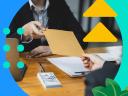 People shaking hands while looking at a sales commission agreement