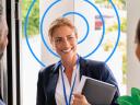 Outside sales rep smiling at clients