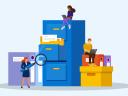 An illustration showing people sitting on filing cabinets while looking at their computer and a businesswoman holding a magnifying glass; grantmaking solutions
