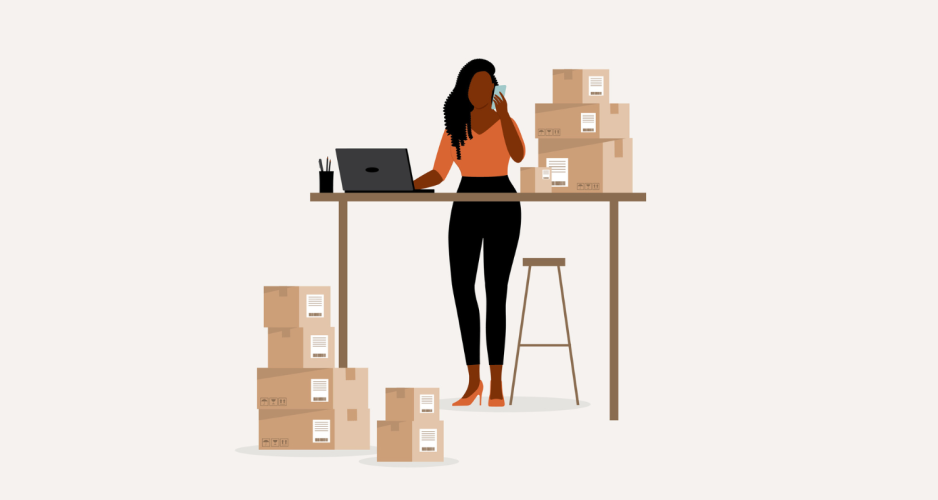 A small business owner uses technology and AI to prepare her inventory of boxes all around her in her office home.
