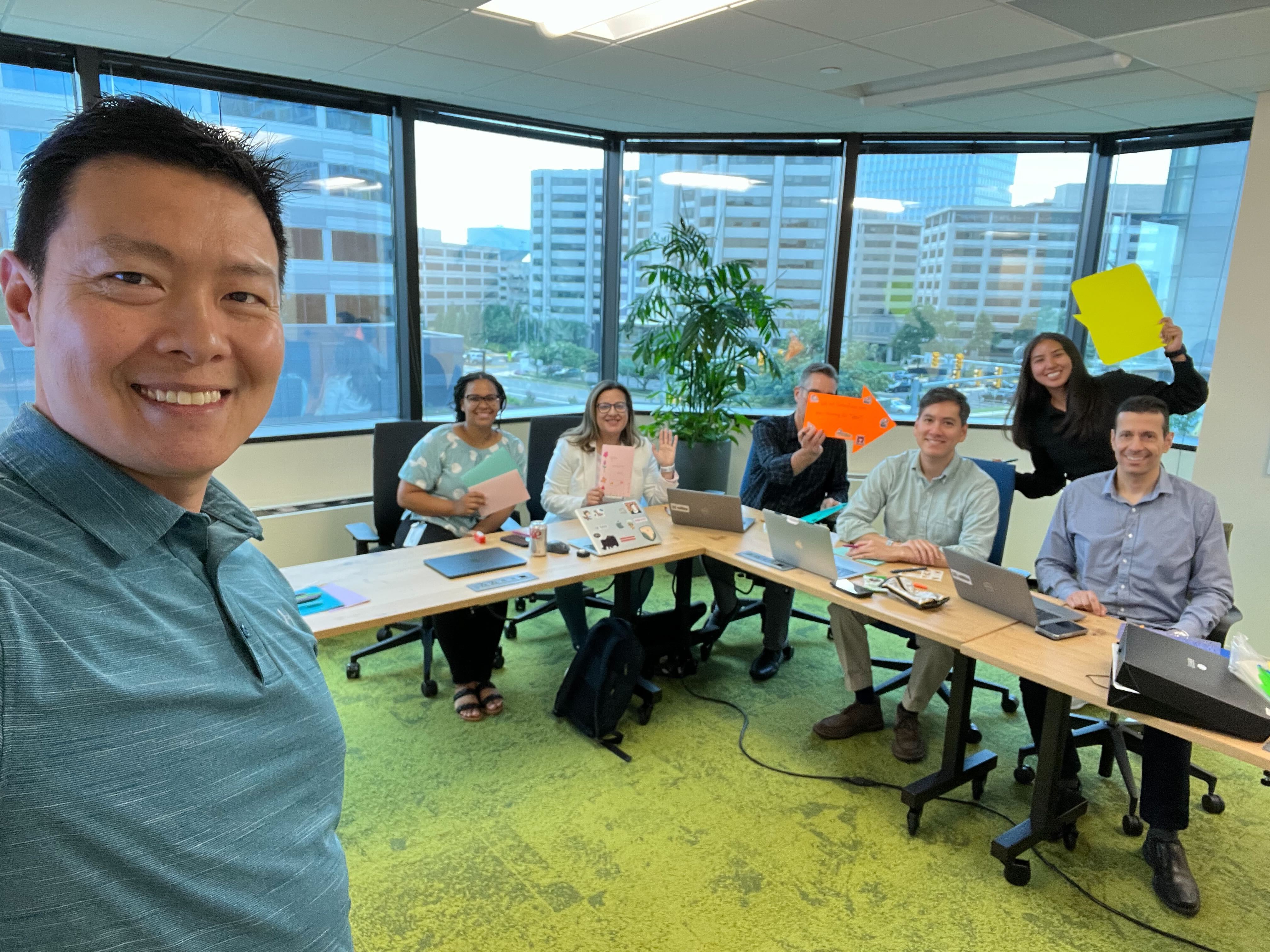Public Sector Cleared Solution Consultant team making cards for hospitalized children after a team meeting in McLean, VA.