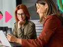 A rep and a manager discussing a sales compensation philosophy