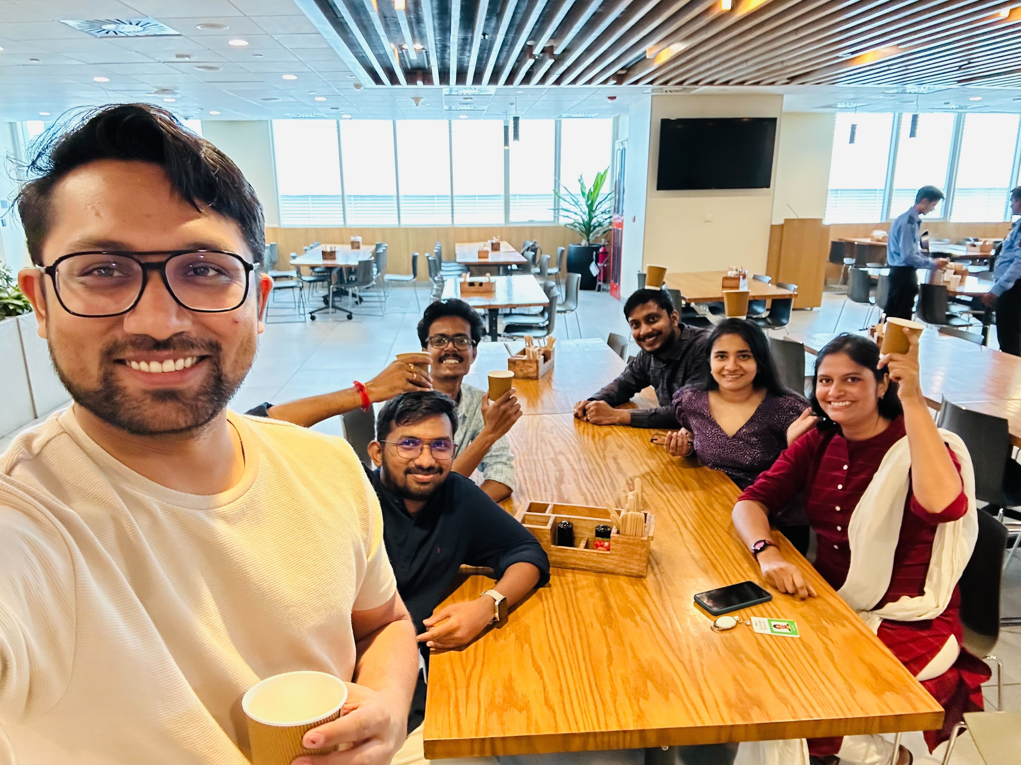 New hires take a well-deserved coffee break in the Hyderabad office's cafeteria.