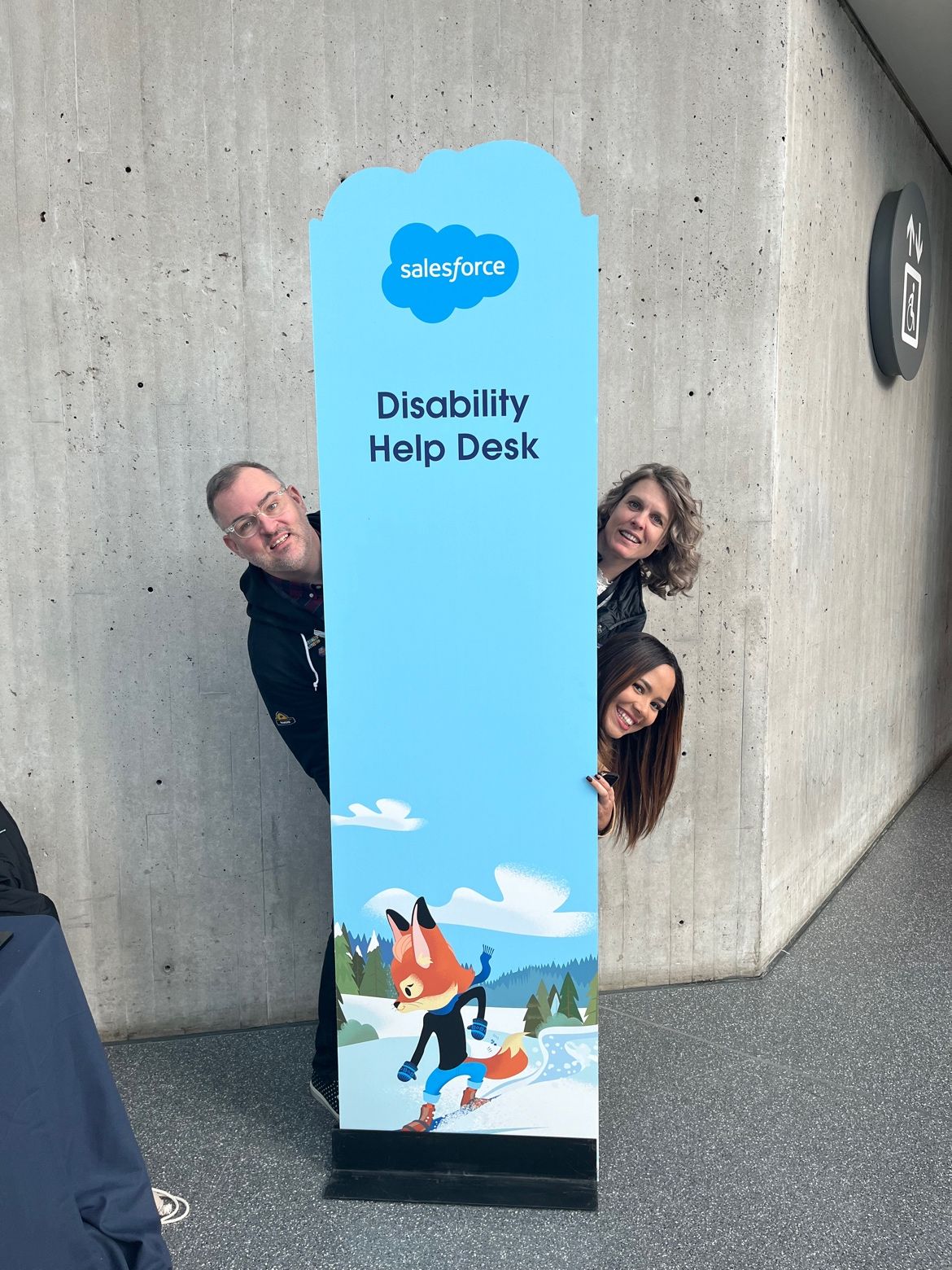 Amy Wood at the Disability Help Desk during World Tour New York 2023. The Disability Help Desk is a key part of Amy’s role, where she oversees staff and coordinates accommodations for large events.