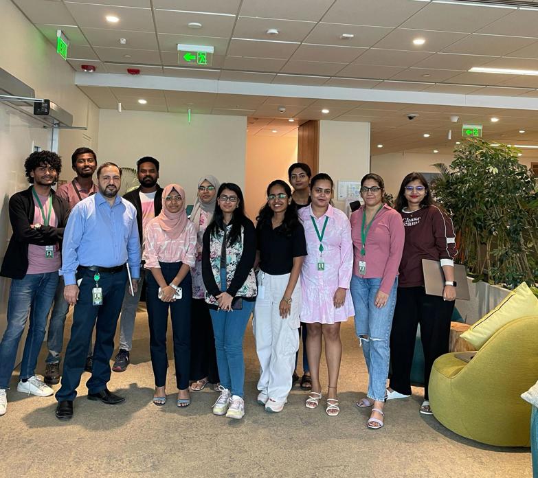 Laysa and the team of interns in the office