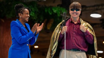 Founder of Blind Institute of Technology, Mike Hess, receiving the Golden Hoodie award at Dreamforce 2023
