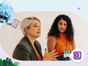 Two women on a speaking panel in business casual attire with a decorative border featuring Agent Einstein holding a calculator in the top left-hand corner and a small Financial Services icon in the bottom right-hand corner