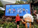 Hayal, in front of an Agentforce billboard, stands next to a Salesforce Einstein statue