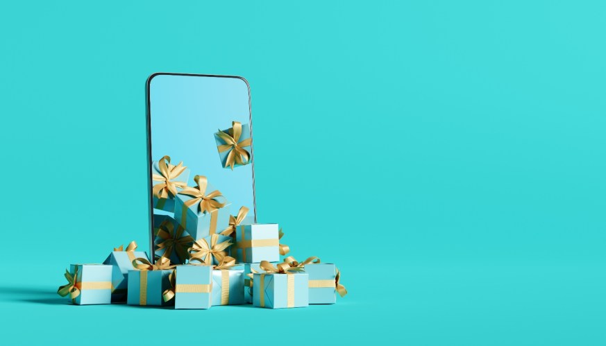 mobile phone showing holiday shopping with AI using gifts