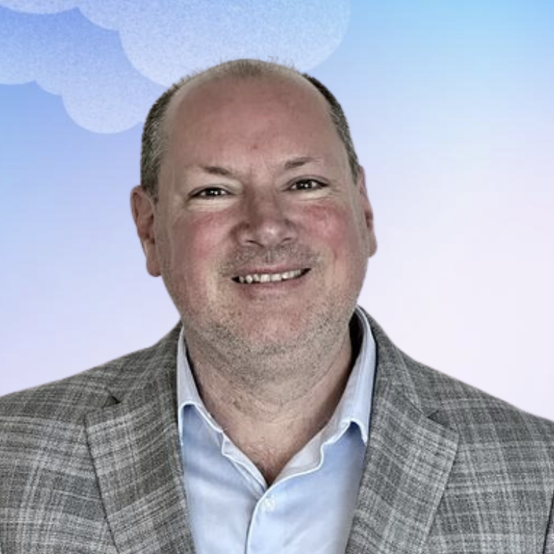 Kevin Karagitz's headshot against a purple and blue background