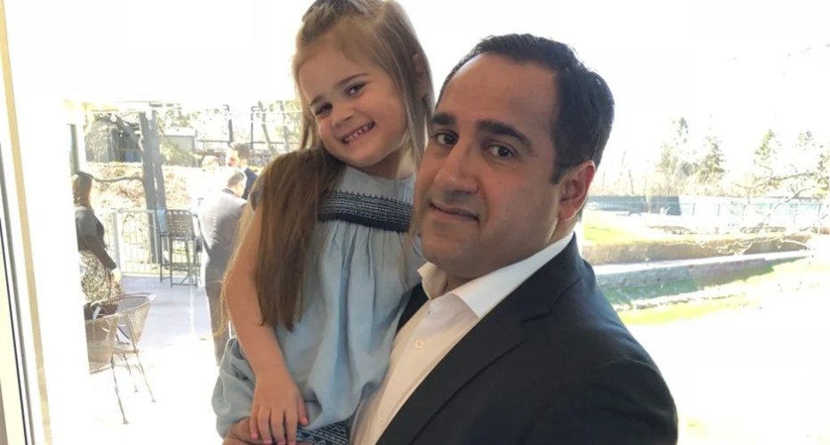 Photo of Vrahram Kadkhodaian with his little daughter.