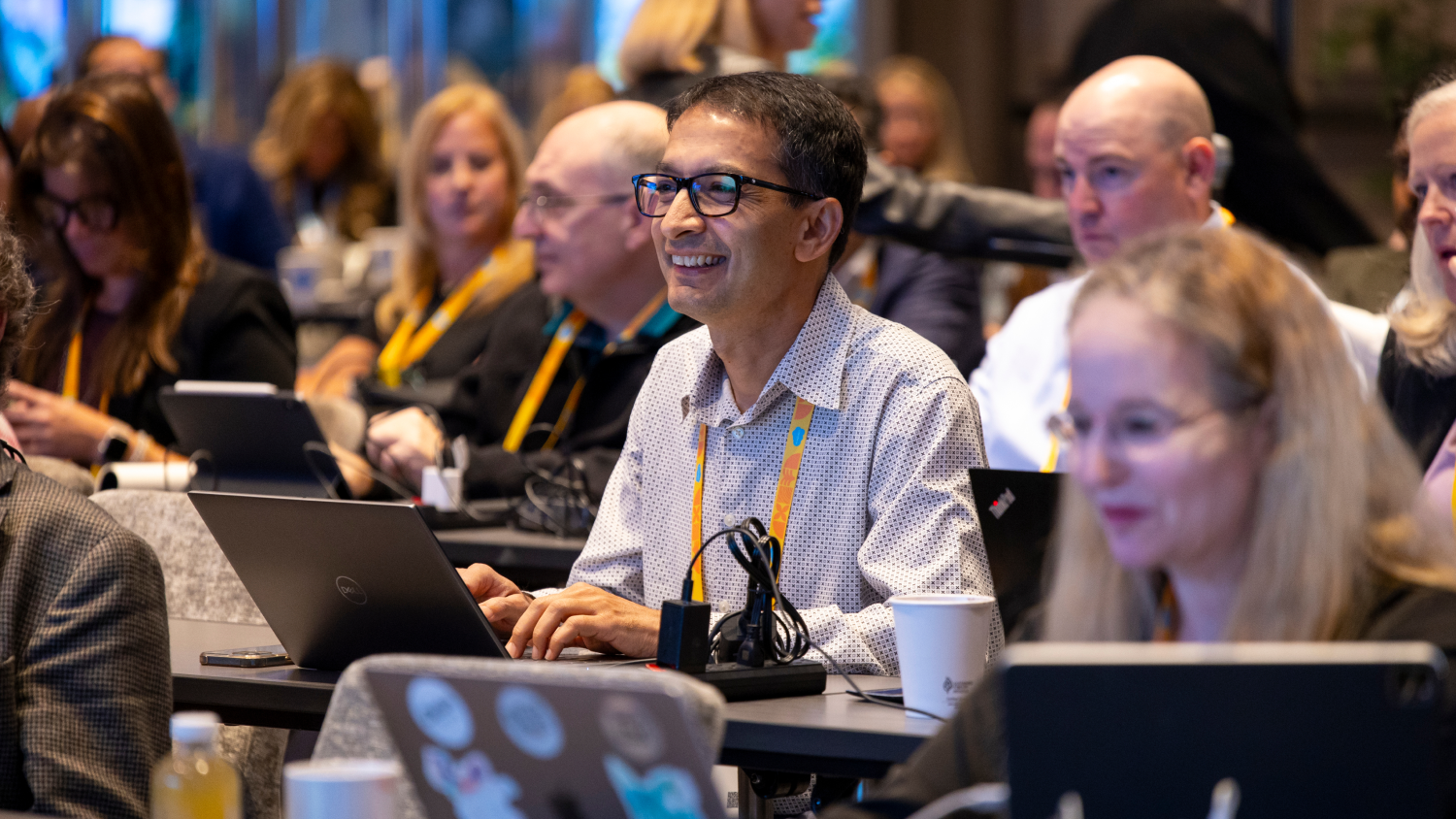 Attendees watch a session at Dreamforce.