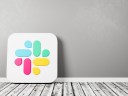 Slack Icon on a wood floor