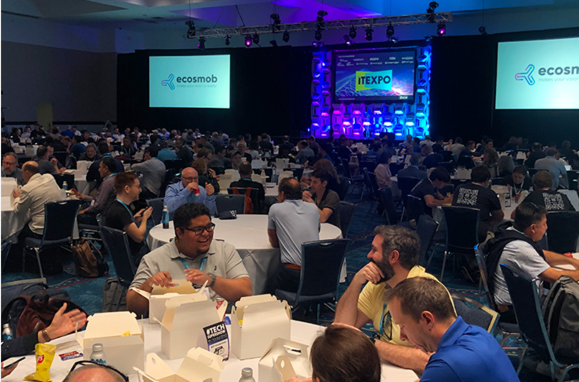 Alt Text: Audience seated and attentively listening during a session at the Generative AI Expo.