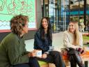 A group of smiling Salesforce employees in Switzerland.