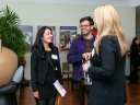 An event photo from Salesforce Startup Summit including attendees collaborating over GTM strategies.
