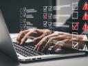 Person typing on laptop overlay with checklist with error symbols. Conveys concept of scale testing.