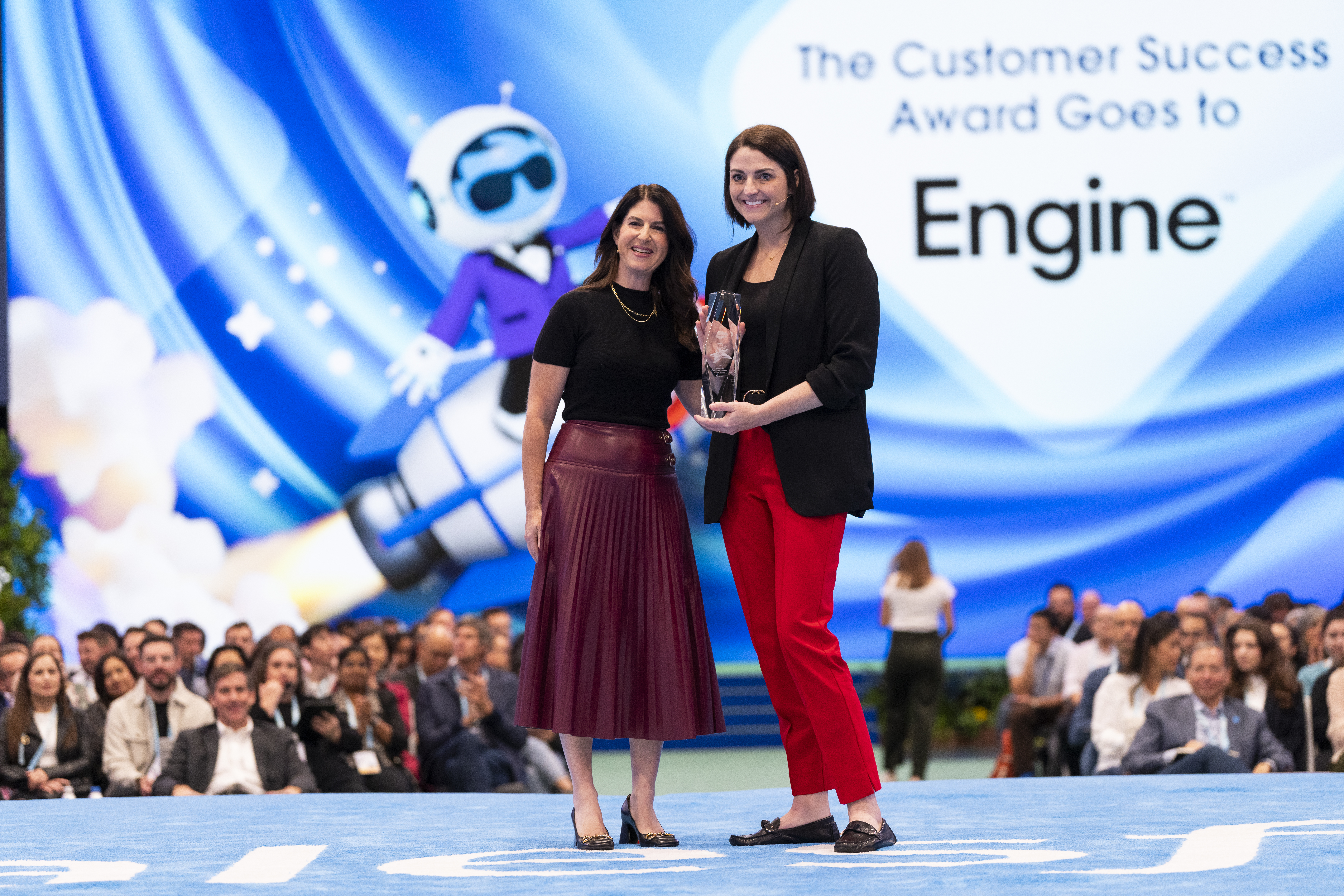 Engine accepting a Customer Success Award at Dreamforce for their work with Agentforce.