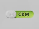 CRM letter on slide switch, rendering on green background.