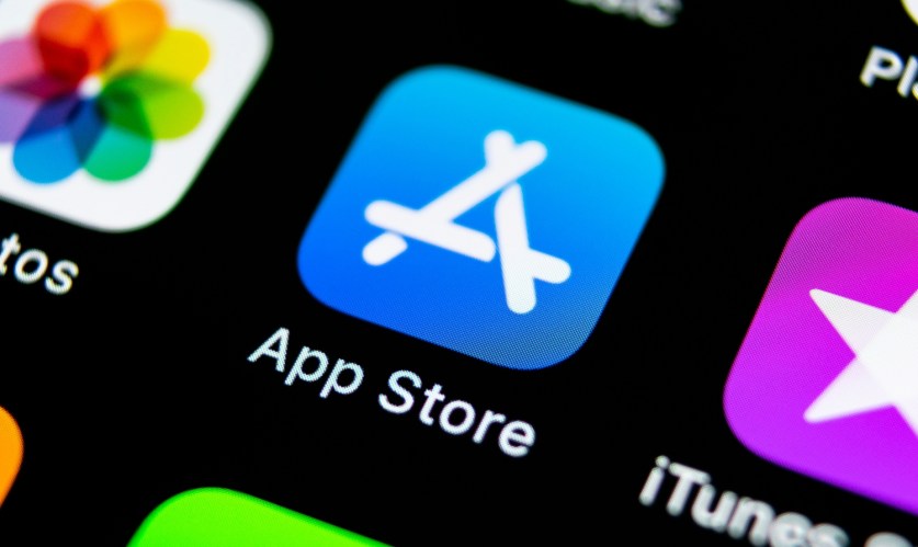 Apple store application icon on Apple smartphone screen close-up showcasing app store optimization.