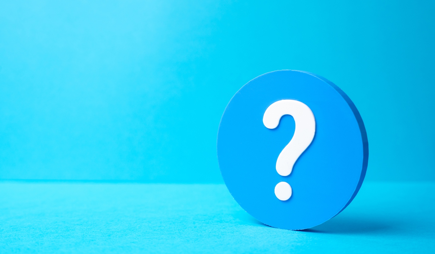 Question mark on blue background.