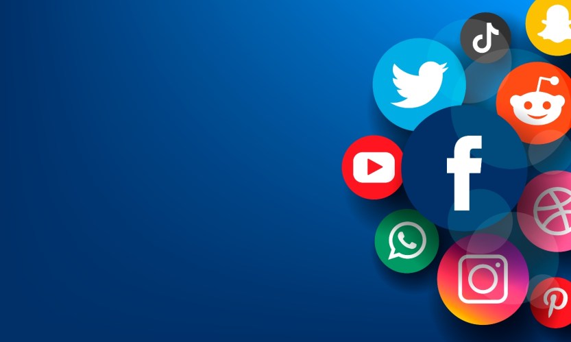 A banner image of the social network icons of the major media platforms in circle chips on the right, across a navy blue background.