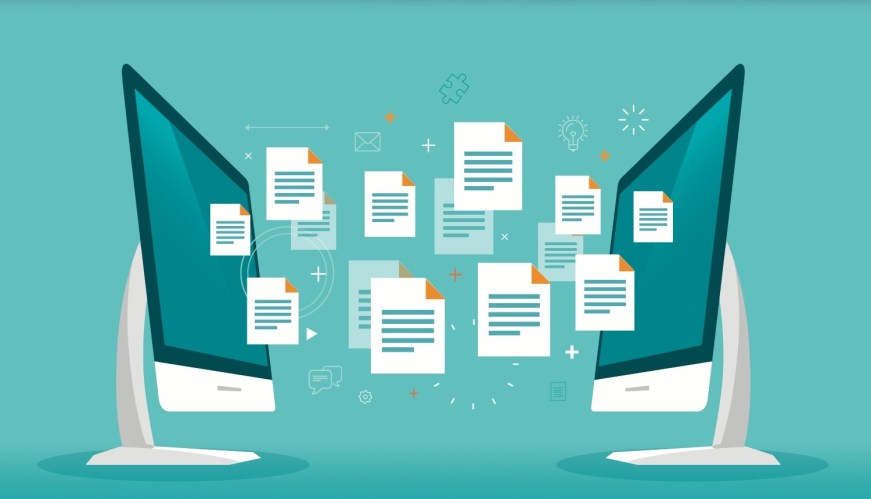 Illustration of two computers facing each other sharing files, with documents in between them on a teal background.