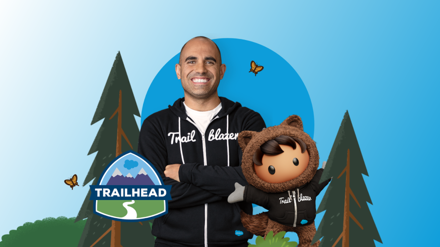 A male Trailblazer and Salesforce character Astro in black hoodies showcasing Trailhead and forest on a blue background.