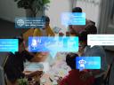 People Engaged in Brainstorming Session with Colorful Sticky Notes and Digital Icons in Modern Workspace Gluon