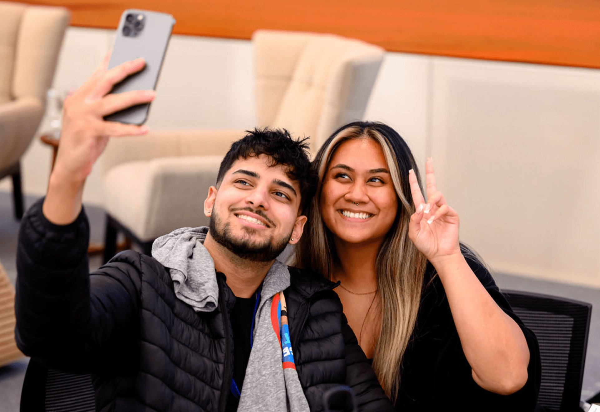 Two Futureforce hires smile and pose for a selfie.