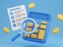 Calculator, magnifying glass, and coins, business finance concept, tax and audit, accounting tools