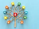 Illustration of a tree with branches leading to blocks with icons of team members on a blue background.
