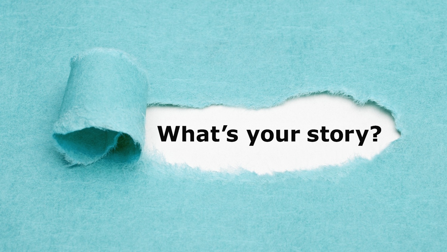 A blue paper ripped with white underneath, showing the font “What’s your story?” typed out.