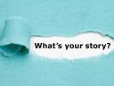 A blue paper ripped with white underneath, showing the font “What’s your story?” typed out.