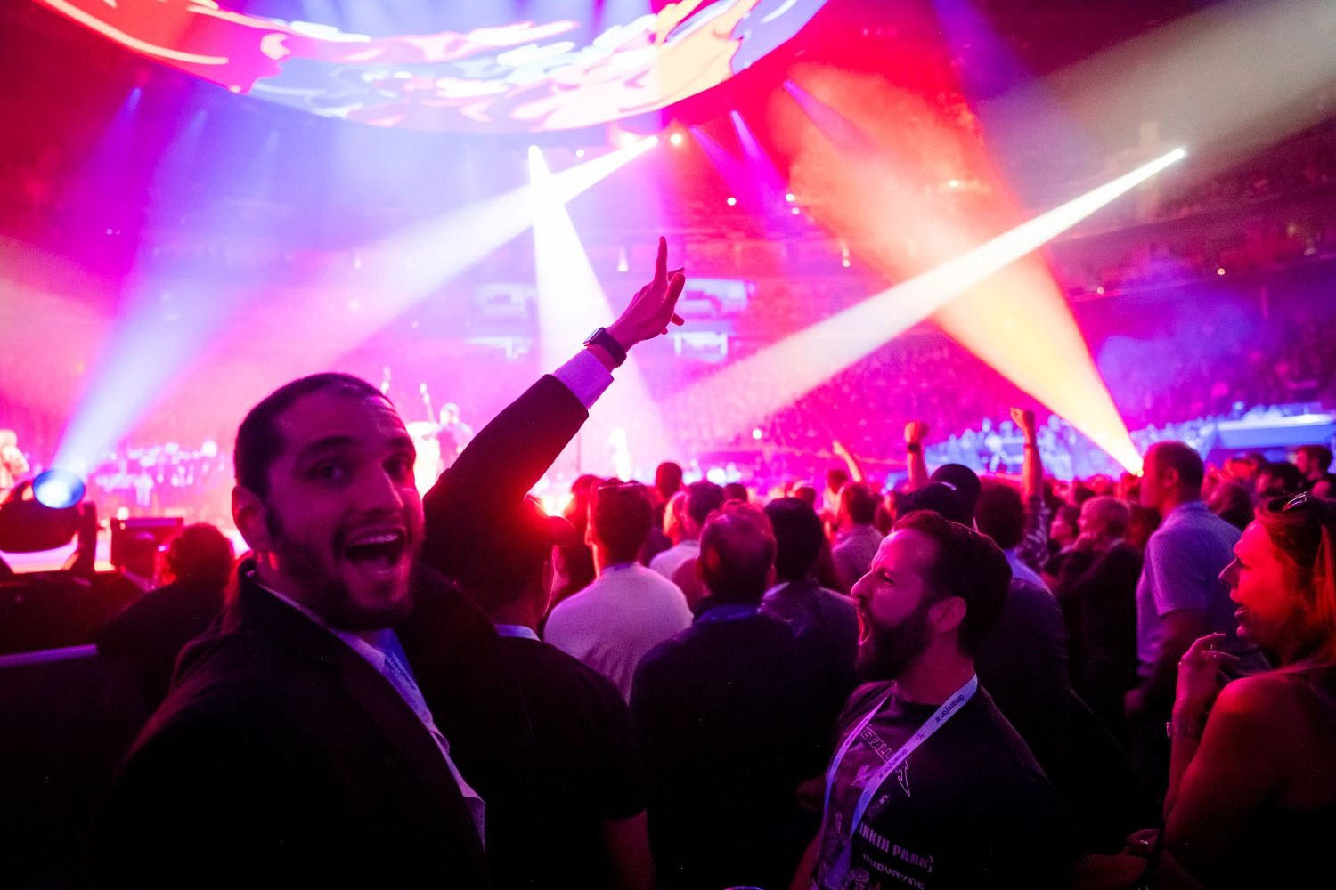 Dreamforce concert with spotlights and stage, crowd view.