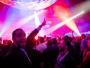 Dreamforce concert with spotlights and stage, crowd view.