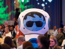 Agent Astro Character interacting with session attendees.