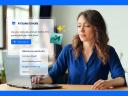 WOman at desk with sales AI agent in business setting with icons on screen.