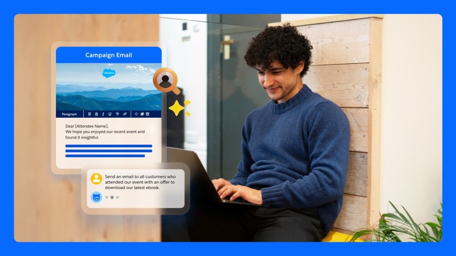 A marketer using a marketing agent with promotional messaging icons on a laptop with a blue border.