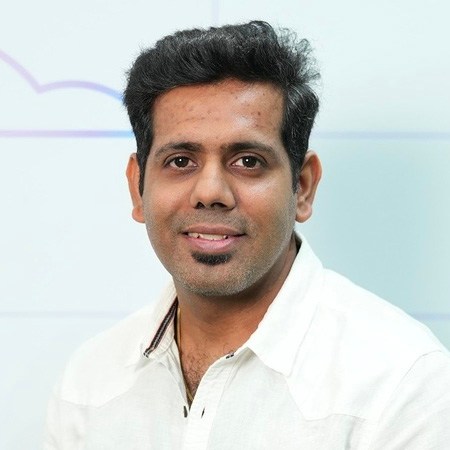 Headshot of Karthik Balasubramanian, Product Management Director at Salesforce