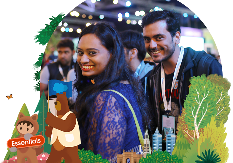 Two people smiling at an event.